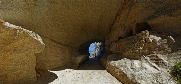 Sanctuary rock passage washed out by the sea to Mare di Tropea beach, Tropea, Vibo Valentia,