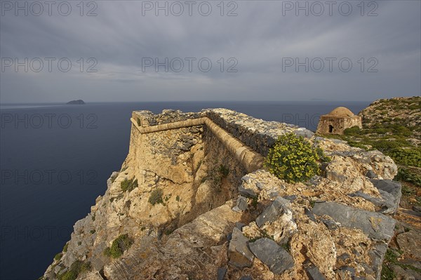 Venetian sea fortress Gramvoussa, morning light, cloudy sky, fortress walls, Pontikos Island,