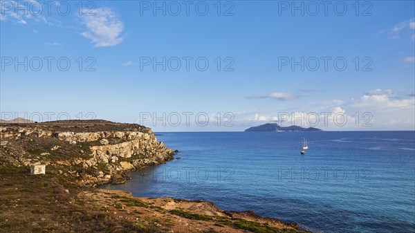 Rocky coast, sailing boats, Levanzo Island, Scogliera di Cala Rossa, Cala Rossa, Favignana, Egadi