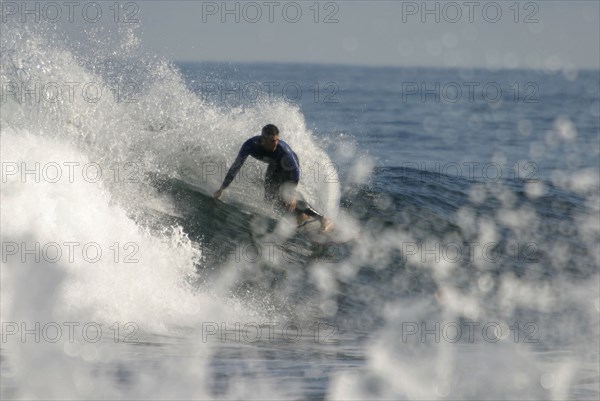 Surfer near Punta del Hidalgo, Tenerife, Canary Islands, Spain, Surfers near Punta del Hidalgo,
