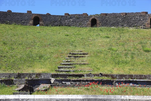 Remains of the audience tiers, steps, The Theatre, Pompeii, ancient city in Campania on the Gulf of