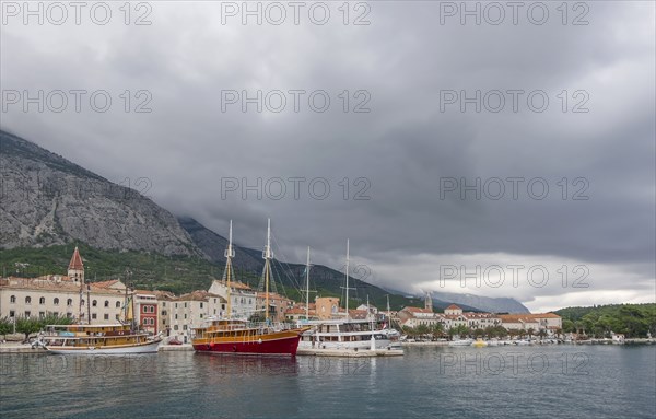 View of town and harbour, Adriatic Sea, Makarska, Makarska Riviera, Dalmatia, Croatia, Europe