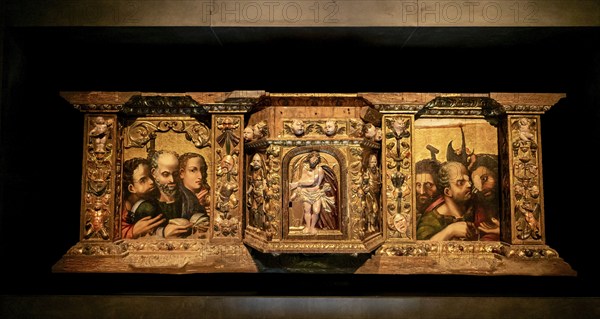 Segovia, Spain, 7 April, 2024: close-up view of a religious triptych painting in the museum of the