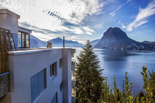 Tenement house on the first coastline with amazing cedar and Lake Lugano. Mount San Salvatore from