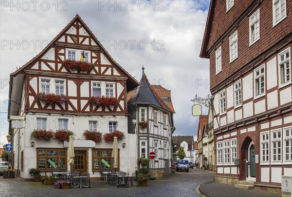 The street with picturesque ancient half-timbered houses in the Fritzlar city, Germany, Europe