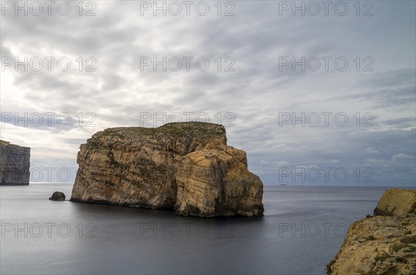 Long exposure landscape view of Dwejra Bay and Ufo Rock on Gozo Island in Malta