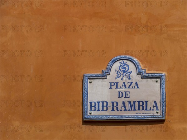 White and blue street sign, Plaza de Bib-Rambla with arabesque decorations, Granada, Andalusia,