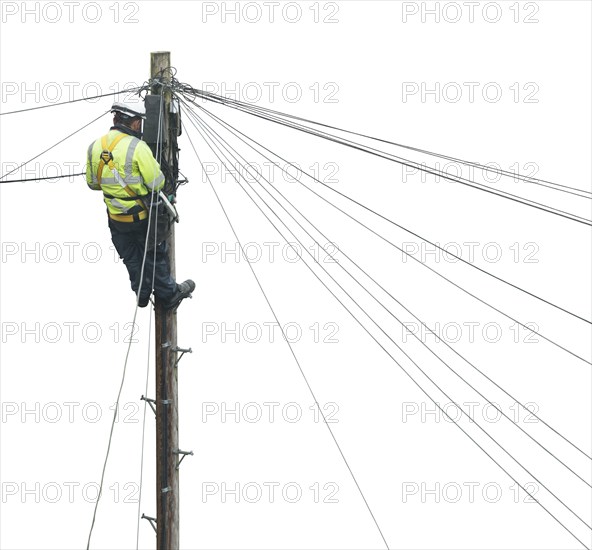 Isolated Lineman (Or Lineworker or Engineer) Fixing A Telephone Line