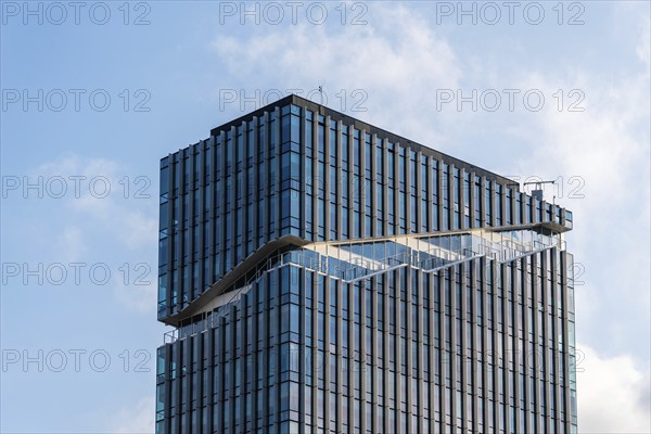 Amsterdam, Netherlands, May 7, 2022: Low angle view of futuristic architecture skyscraper against