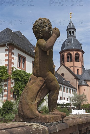 Figure sculpture statue in the monastery garden of St. Marcellinus and Peter in Seligenstadt,