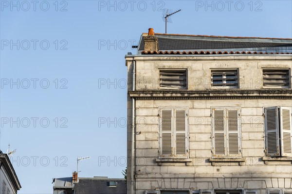 Decadent old residential buildings in the historic centre of La Rochelle, France, Europe