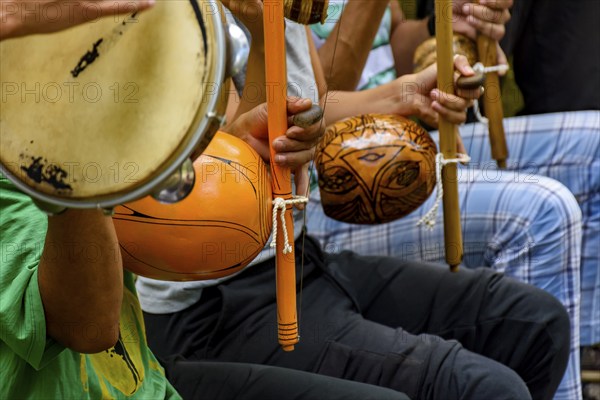 Afro Brazilian percussion musical instruments during a capoeira performance in the streets of
