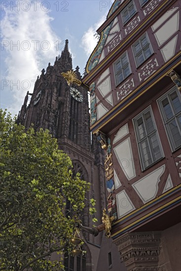 Corner detail of a colorful half timbered house, house to the Golden Libra, in the new historic old