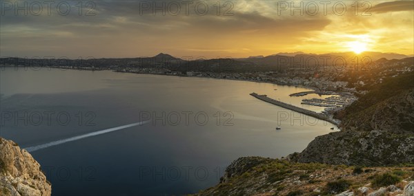 Panorama landscape view of Javea Bay and port in Alicante Province at sunset