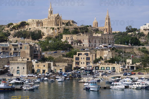 This bustling harbour full of fishing boats is the first place which greets visitors to Gozo,
