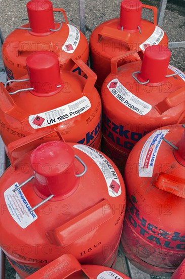 Red gas cylinders with propane gas, Allgäu, Bavaria, Germany, Europe