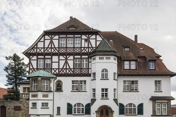 The street with picturesque ancient half-timbered houses in the Fritzlar city, Germany, Europe