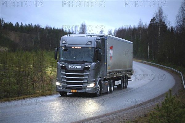 LOHJA, FINLAND, NOVEMBER 24, 2016: New Next Generation Scania R truck on the road in November sleet