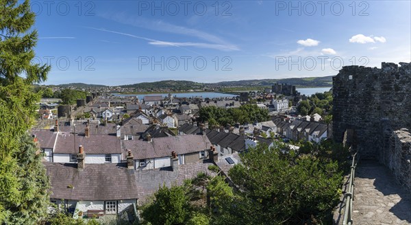 Conwy, United Kingdom, 27 August, 2022: view of the walled Welsh town of Conwy with the medieval