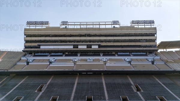 An aerial view of Neyland Stadium reveals a massive, iconic structure nestled by the Tennessee
