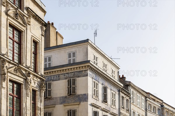 Decadent old residential buildings in the historic centre of La Rochelle, France, Europe
