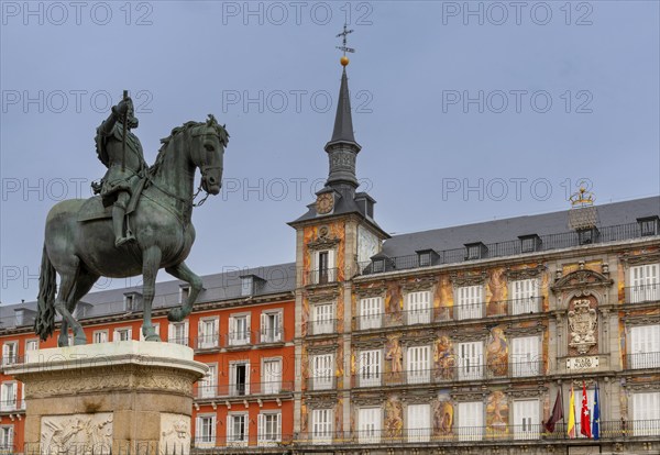 Madrid, Spain, 6 April, 2024: statue of Felipe II and the landmark buildings of the Plaza Mayor