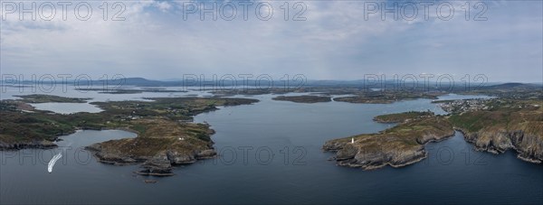A panorama view of the entrance to the Baltimore Harbor in West Cork with teh Sherkin Island