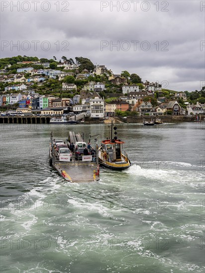 Dartmouth, Devon, England, UK, May 26, 2022: The Lower Ferry crosses the River Dart on its way to
