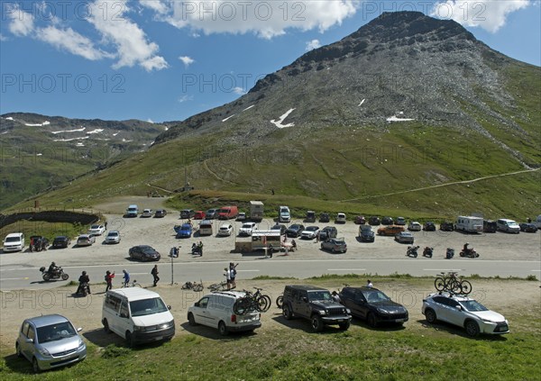 Car park with cars at the top of the Furka Pass, Goms, Valais, Switzerland, Europe