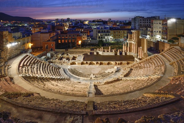 Teatro Romano, blue hour, Roman amphitheater, in the old town of Cartagena, Murcia region, Spain,