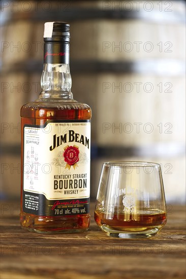 March 28, 2019, Minsk, Belarus, Bottle of kentucky straight bourbon whiskey with glass on wooden