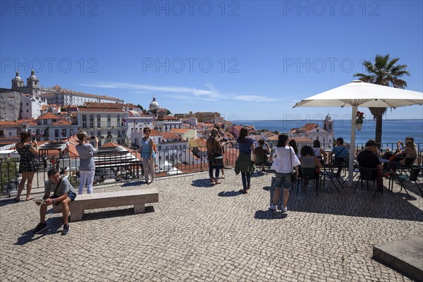 Miradouro Santa Luzia with a view of the historic centre of Lisbon, at the back left the monastery