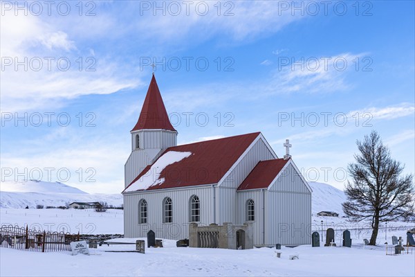 Small church with red roof in the snow, Glaumbaer Museum Village, Northern Iceland Vestra, Iceland,