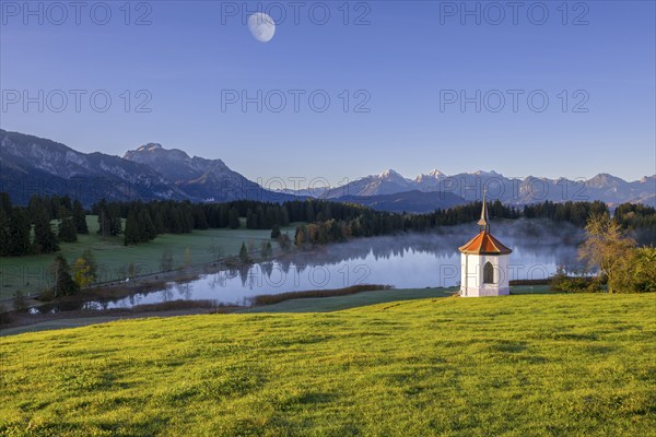 Photomontage, chapel at Hegratsrieder See, near Füssen, moon, Allgäu Alps, Allgäu, Bavaria,