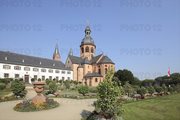 Garden with Einhard Basilica of St. Marcellinus and Peter, monastery complex, Seligenstadt, Main,