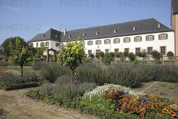 Convent building with garden from the monastery complex, Seligenstadt, Main, Hesse, Germany, Europe