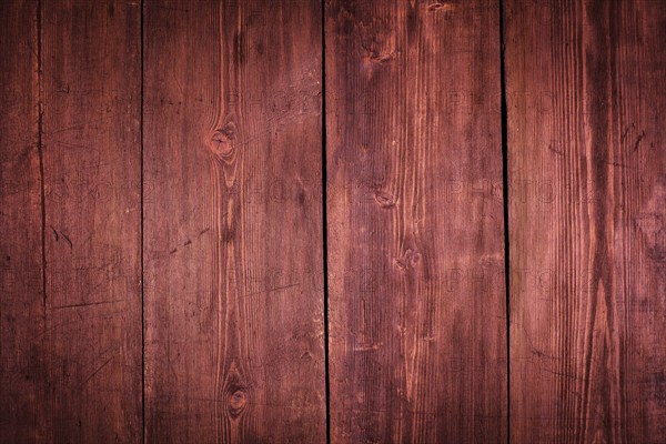 Marsala colored old wood background, wooden planks texture close up