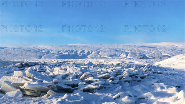 Icefall at the river Skialfandafljot z, near the waterfall Godafoss, snow-covered landscape, North