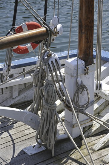 Ropes in wooden blocks, pulleys on board of a sailing ship, Brittany, France, Europe