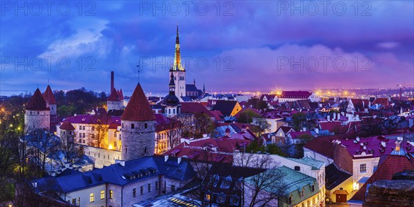 Panorama of aerial view of Tallinn Medieval Old Town with St. Olaf's Church and Tallinn City Wall