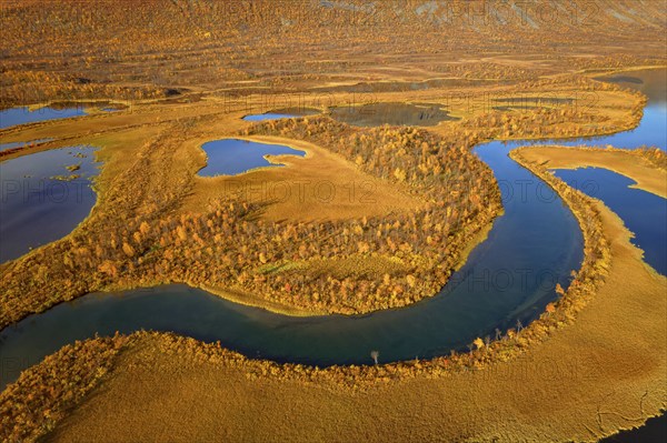 Drone shot, view of the valley Vistasvagge with the meandering river Vistasjakka and countless