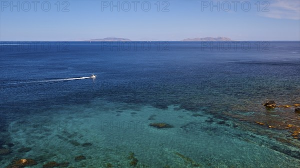Passing boat, green sea, blue sea, Favignana, Levanzo, Marettimo, Egadi Islands, Sicily, Italy,