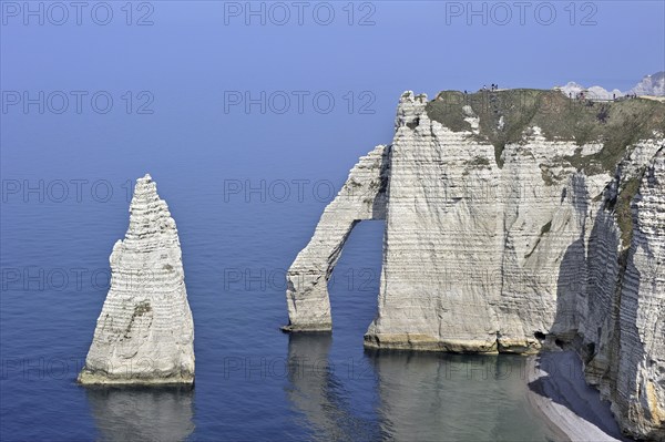 L'Aiguille and the Porte D'Aval, a natural arch in the chalk cliffs at Etretat, Côte d'Albâtre,