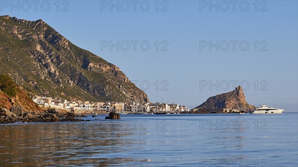 Morning light, luxury yacht, sailing boat, Castello di Punta Troia, harbour, Martettimo town,
