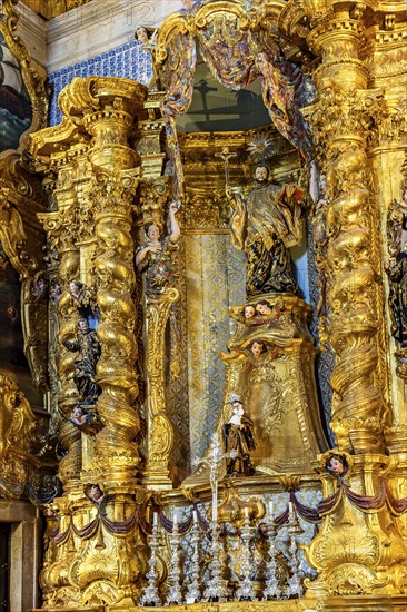Baroque gold-leafed altar in the historic church of Pelourinho in the city of Salvador, Bahia,