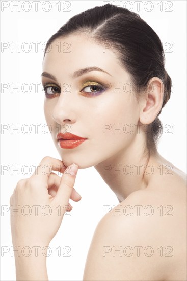Beauty fashion girl. Portrait of beautiful young woman with fresh clean skin isolated on white