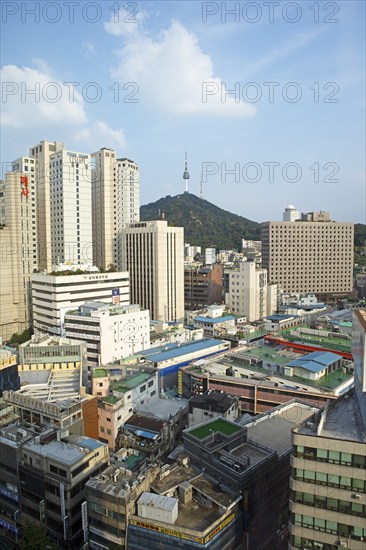View of the houses of Seoul, in the back the N Seoul Tower on Namsan Hill or South Mountain,