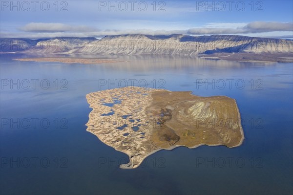 Aerial view over Flintholmen, small island in Ekmanfjorden, fjord in the Nordre Isfjorden National