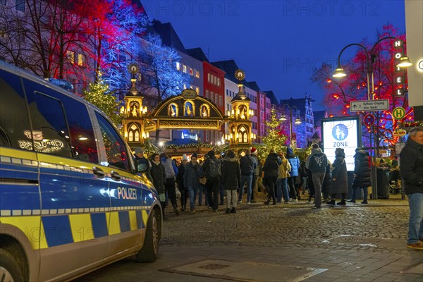 Police patrol car in front of the Christmas market on the Alter Markt in the old town of Cologne,