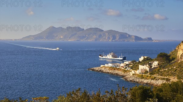 Ship at anchor, hydrofoil, approaching, Levanzo town, Favignana, Levanzo, Egadi Islands, Sicily,